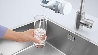 Filling Glas of Water with On Tap.