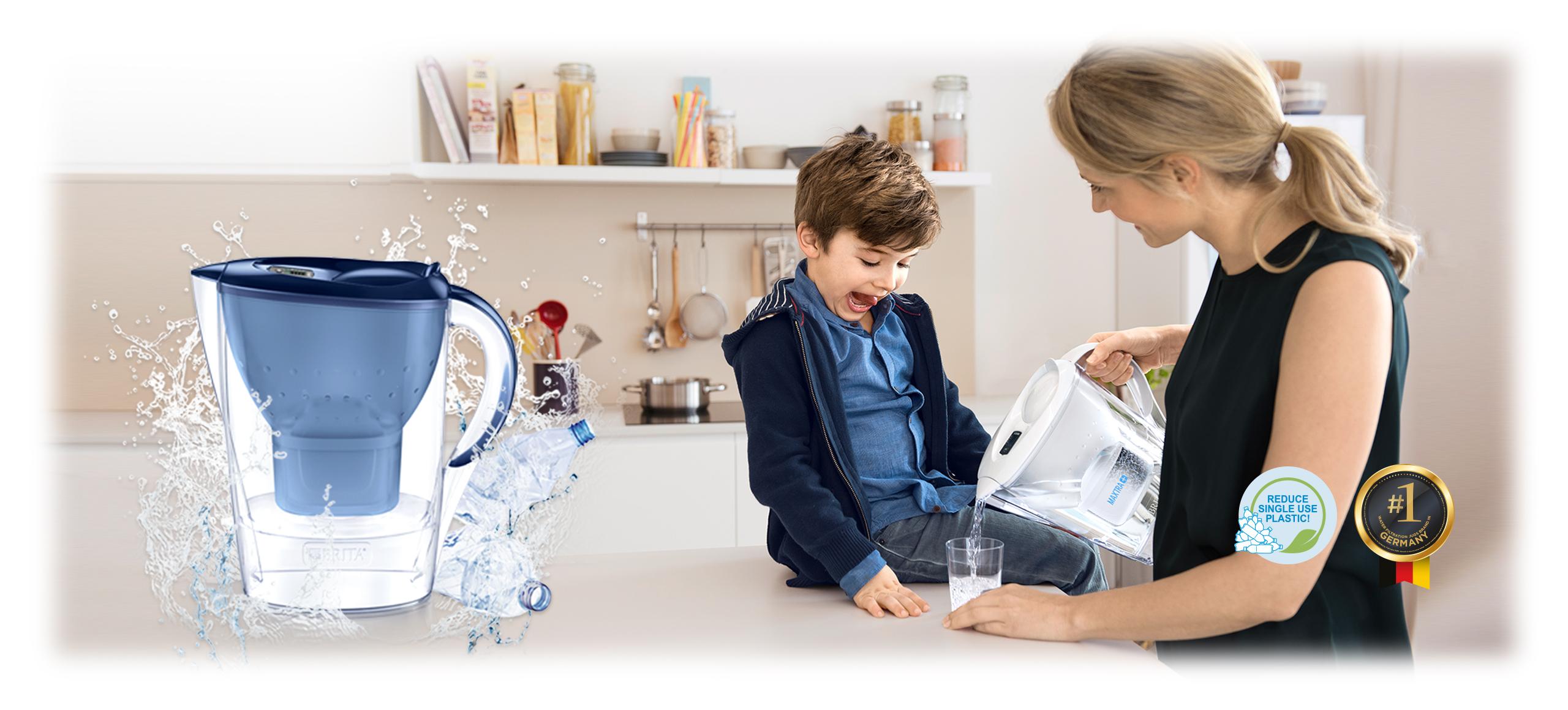 BRITA filter jug and woman with child in kitchen